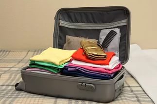 Как правильно уложить вещи в чемодан