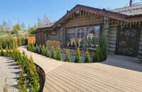 Фото Срубы домов и бань из бревна ручной рубки от компании Изба