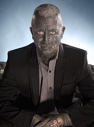 На пост президента Чехии  претендовал художник, с головы до ног покрытый татуировками. Фото 4 