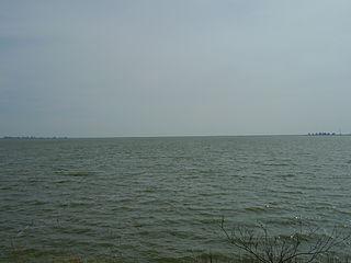 Проект «Зёйдерзее» (на фото) позволил защитить центральные Нидерланды от наводнений и превратить залив Северного моря в два озера и 1650 км² новой земли. Фото 4 