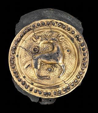 То ли олень в ошейнике, то ли собака с копытами — понять не удаётся. Фото 1 