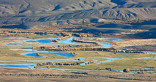 Место для отдыха можно найти даже посреди бурлящего потока на горной реке. Фото 1 