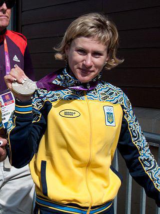 Украинка Инна Радомская выиграла «золото» Пекинской олимпиады, опередив преследовательницу всего на 0,004 секунды. Фото 2 