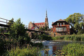 Согласно ряду опросов самым красивым католическим храмом Белоруссии признан не собор большого города, а храм в деревне с населением 494 человека. Фото 1 