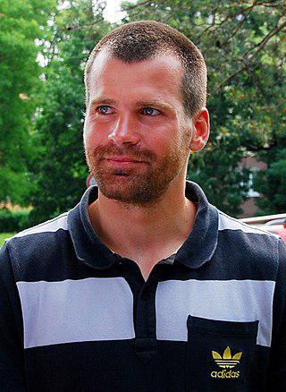 Трёхкратный олимпийский чемпион работает механиком в собственном автосервисе. Фото 3 