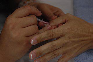 Клиентам китайской сети ресторанов бесплатно делают маникюр и массаж. Фото 1 