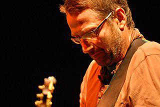 Среди гитарных богов есть «четверорукий монстр», «исследователи тёмной стороны луны» и «ползучий царь змей». Фото 1 